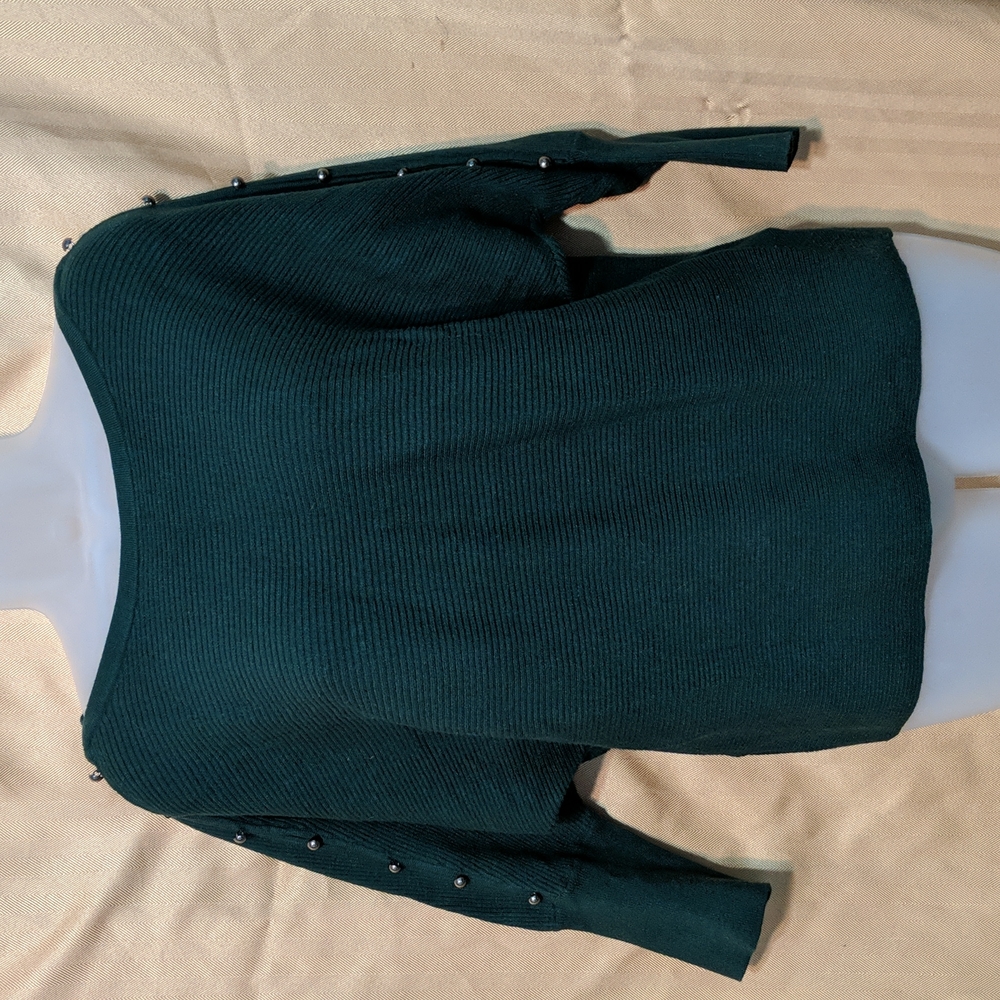 Jennifer Lopez green sweater